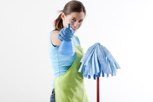 Carpet cleaning team preparing equipment safely before a service