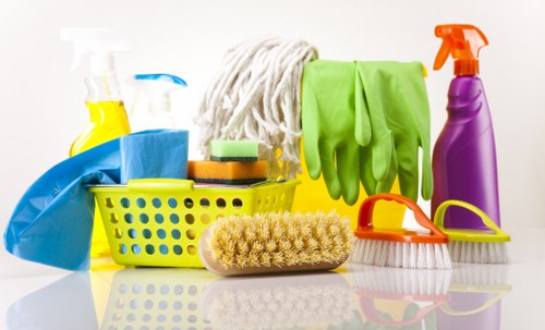 Technician checking cleaning solution and surface conditions